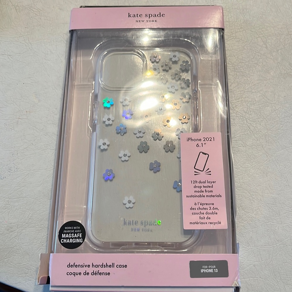 Kate Spade iPhone 13 hard shell case. White and silver flowers
